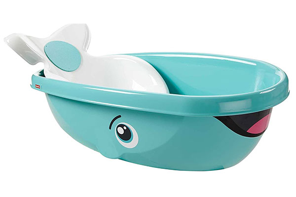 banheira infantil plástica em formato de baleia, com olhos e rabo