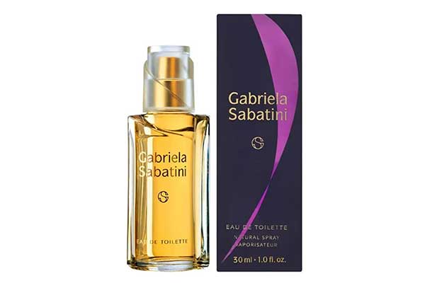 Gabriela-Sabatini-Eau-de-Toilette Frasco de vidro redondo de perfume ao lado de embalagem de papel em forma de caixa