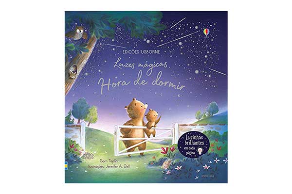 capa de livro com o desenho de dois ursos, um adulto e um filhote, encostados em uma cerca no campo, olhando para o céu estrelado