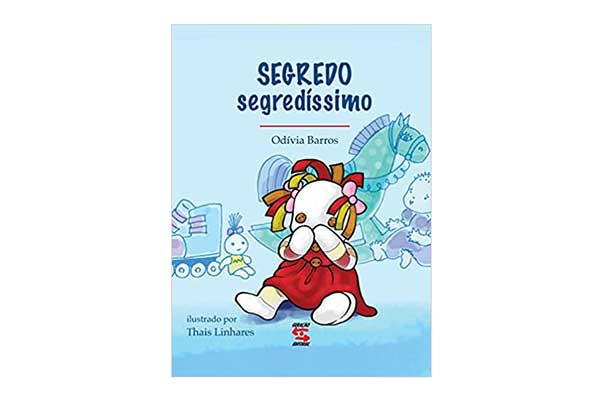 livro-Segredo-Segredíssimo capa do livro Segredo Segredíssimo com a ilustração de uma boneca sentada e com as mãos na boca