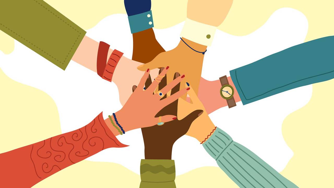 ilustração de várias mãos sobrepostas umas às outras, num gesto de apoio mútuo