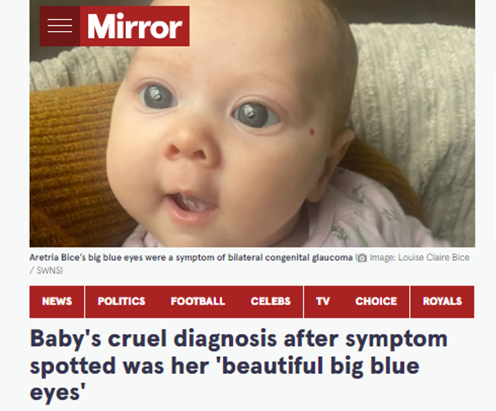 Print da notícia do site The Mirror, que mostra uma foto da bebê com os olhos azuis bem abertos e, embaixo, o título da notícia em inglês